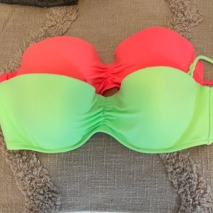 Two strapless 36B VS swim tops